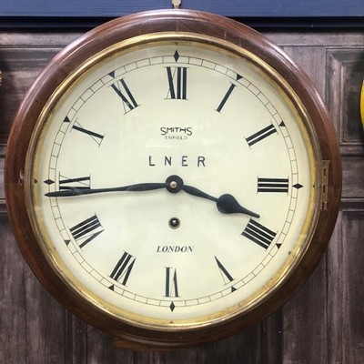 Lot 513 - A REPRODUCTION STATION WALL CLOCK