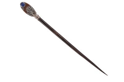 Lot 444 - A CHILEAN SILVER, COPPER AND LAPIS LAZULI HAIR PIN, ALONG WITH A CANDLE SNUFFER