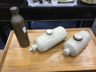 Lot 507 - A 19TH CENTURY BRASS WATER BOTTLE AND TWO STONEWARE BOTTLES