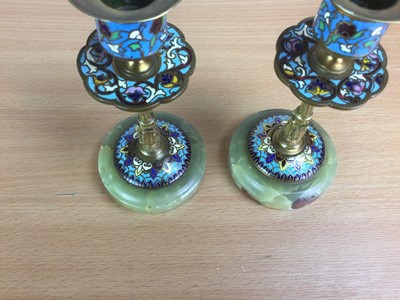 Lot 63 - A PAIR OF LATE 19TH CENTURY BRASS AND CHAMPLEVÉ ENAMEL CANDLESTICKS
