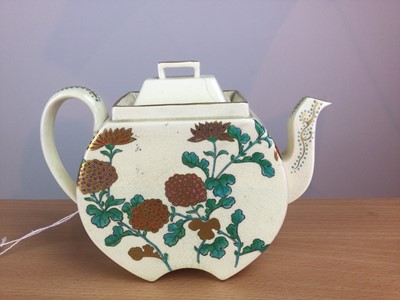 Lot 69 - A WEDGWOOD AESTHETIC MOVEMENT EARTHENWARE TEAPOT AND COVER