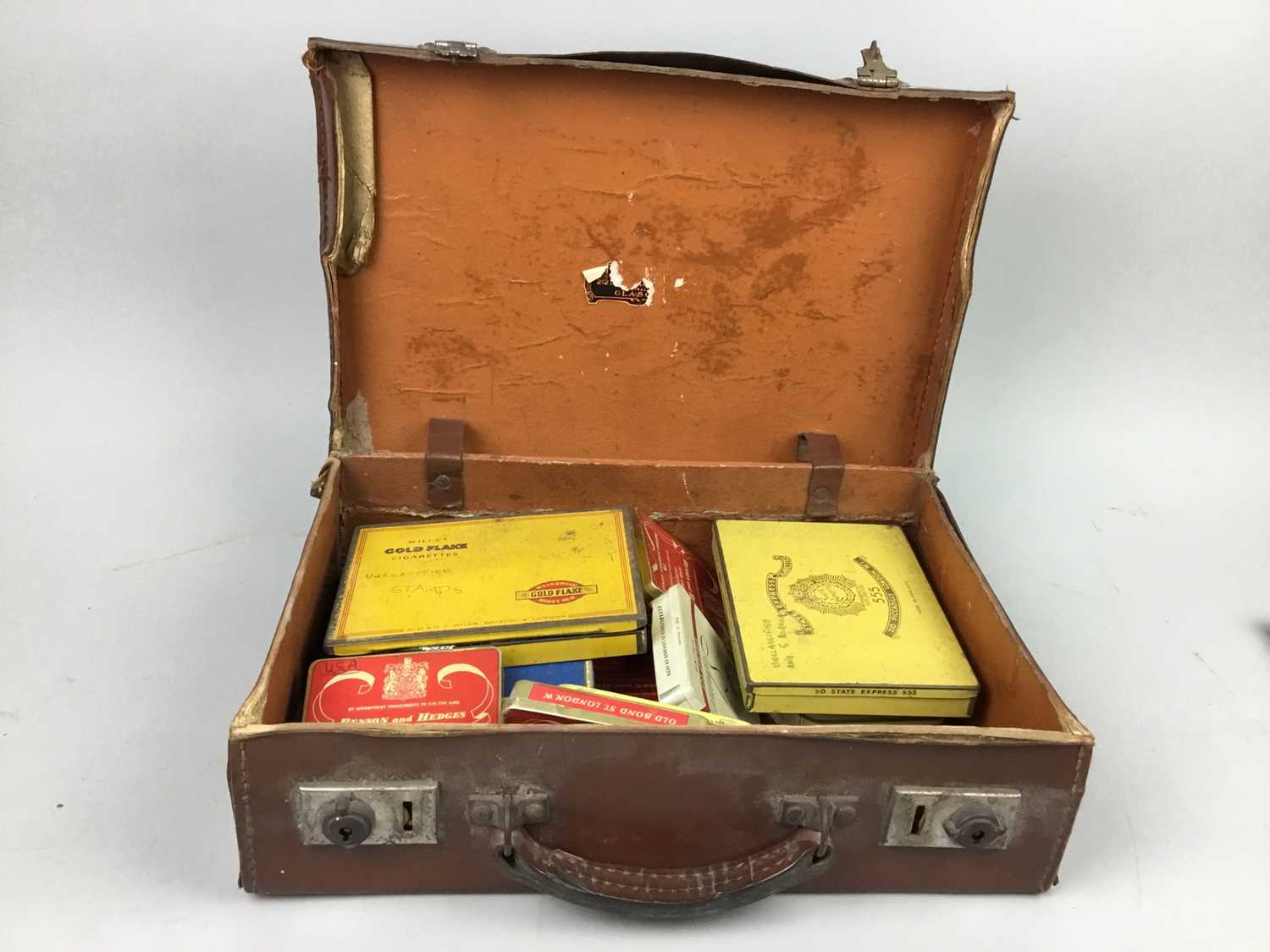 Lot 10 - A COLLECTION OF VINTAGE CIGARETTE TINS, ALONG WITH THREE STAMP ALBUMS