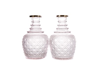 Lot 1055 - A PAIR OF SILVER MOUNTED REGENCY CUT GLASS MAGNUM DECANTERS
