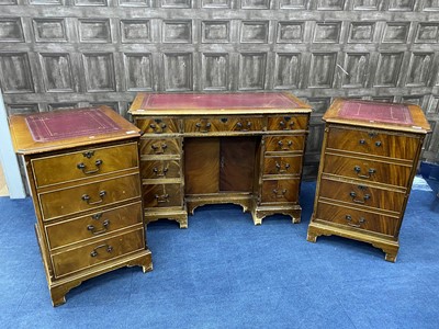 Lot 70 - A MAHOGANY REPRODUCTION WRITING DESK AND TWO FILING CABINETS