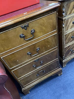 Lot 70 - A MAHOGANY REPRODUCTION WRITING DESK AND TWO FILING CABINETS