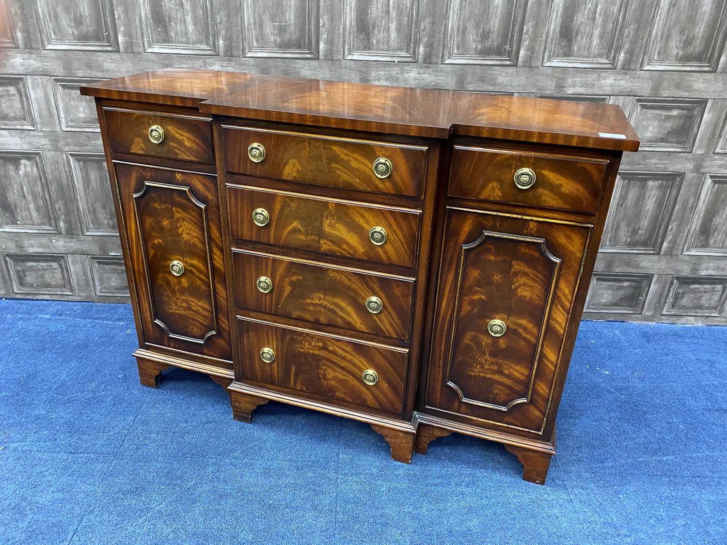 Lot 72 - A MAHOGANY REPRODUCTION BREAKFRONT SIDE CABINET