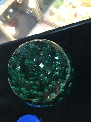 Lot 1150 - A LATE VICTORIAN GREEN GLASS DUMP PAPERWEIGHT