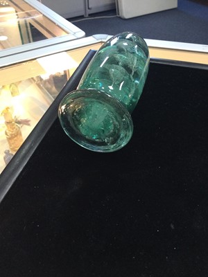 Lot 1152 - A LATE VICTORIAN GREEN GLASS DUMP PAPERWEIGHT AND TWO OTHERS