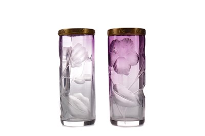 Lot 1154 - A PAIR OF EARLY 20TH CENTURY MOSER AMETHYST GLASS BUD VASES