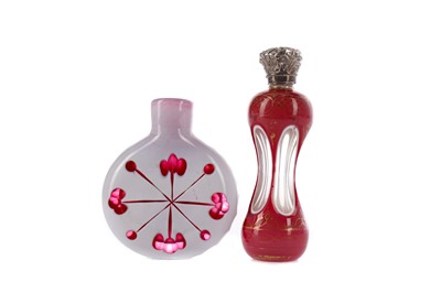 Lot 1168 - A LATE VICTORIAN PINK OVERLAID SCENT BOTTLE AND ANOTHER