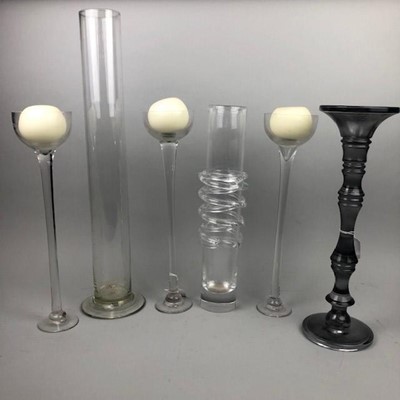 Lot 52 - A SET OF THREE CLEAR GLASS CANDLESTICKS ALONG WITH OTHERS
