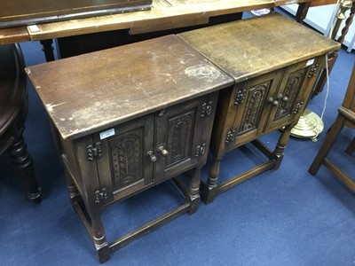 Lot 155 - A PAIR OF SMALL OAK TWO DOOR CUPBOARDS