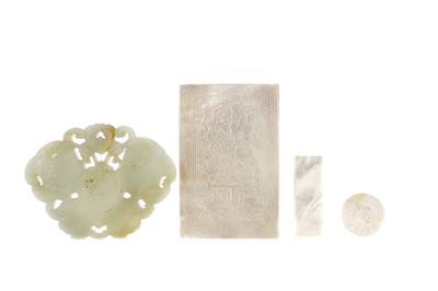 Lot 885 - A CHINESE GREEN JADE AMULET AND MOTHER OF PEARL COUNTERS