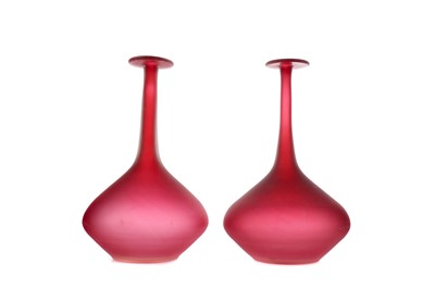 Lot 1122 - A PAIR OF RED SATIN GLASS VASES