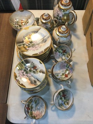 Lot 121 - A JAPANESE EGGSHELL PORCELAIN TEA SERVICE