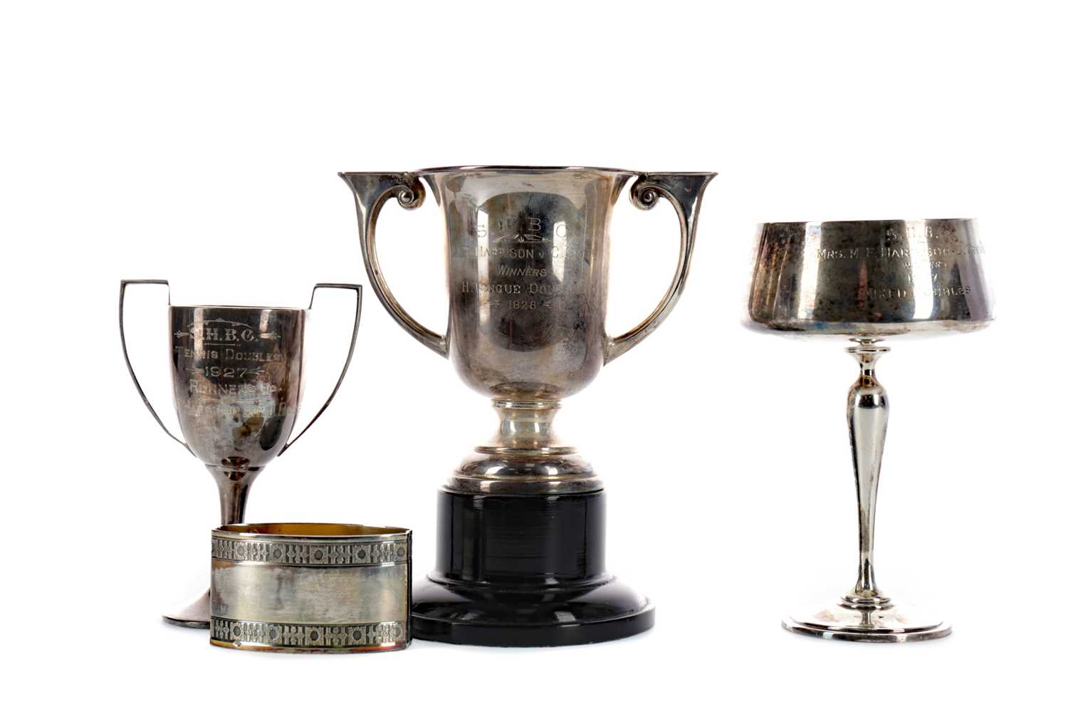 Lot 465 - THREE EARLY 20TH CENTURY SILVER TROPHY CUPS, ALONG WITH A NAPKIN RING