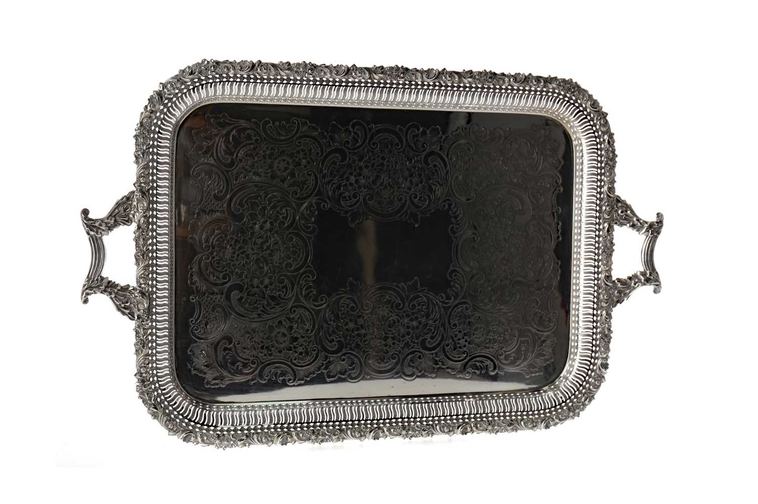 Lot 477 - A LATE VICTORIAN SILVER PLATED TEA TRAY