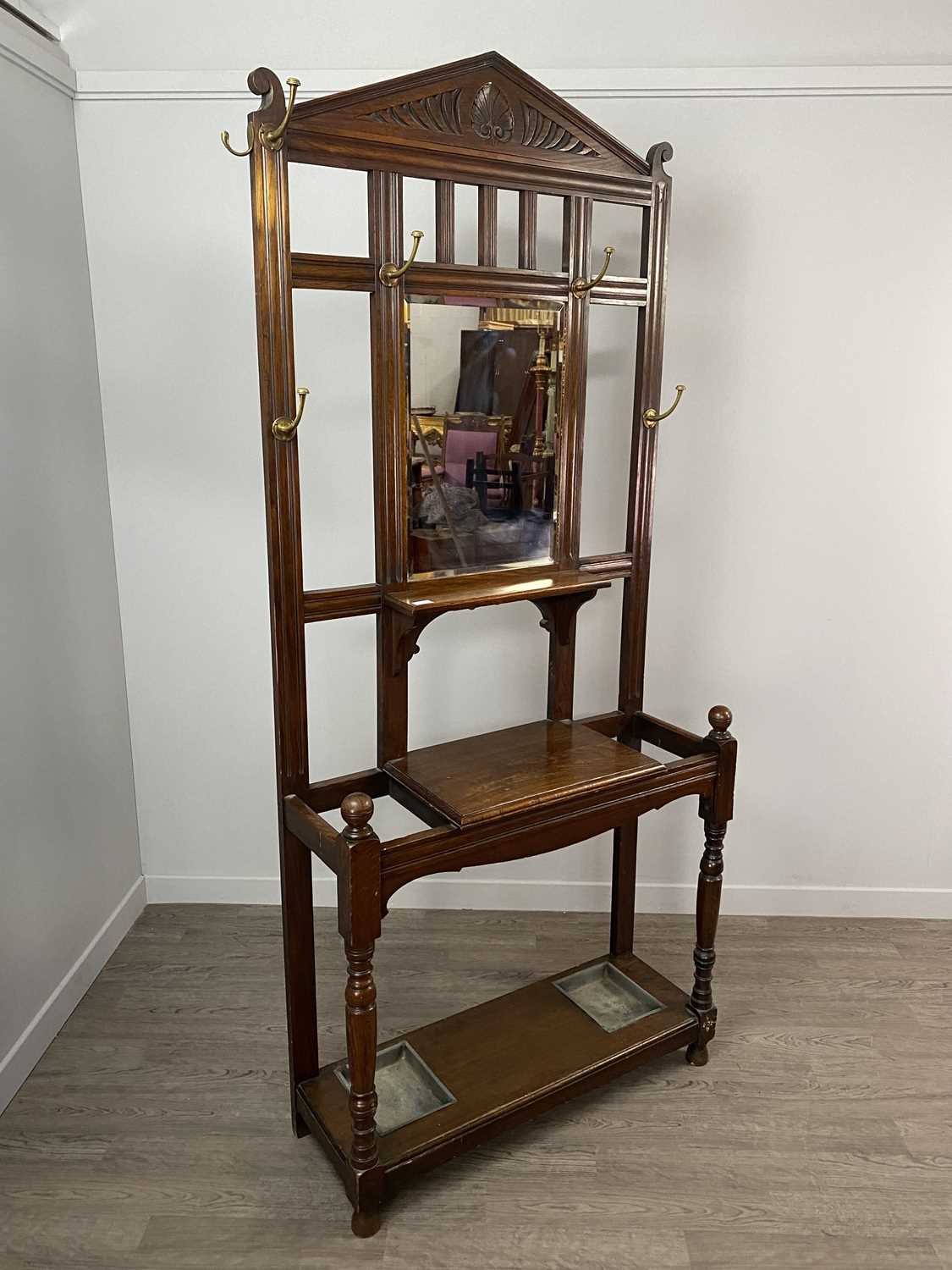 Lot 1628 - A LATE VICTORIAN OAK HALL STAND