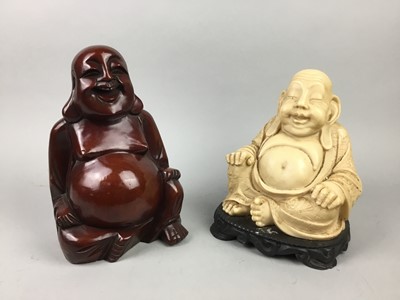 Lot 183 - A HARDWOOD FIGURE OF A BUDDHA, ANOTHER AND A CIRCULAR WALL HANGING