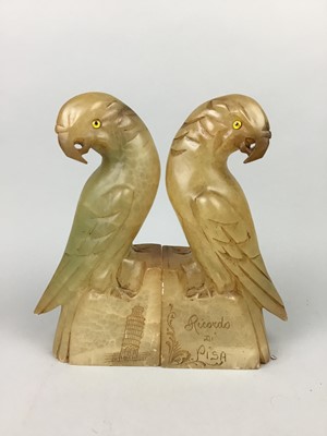 Lot 184 - A PAIR OF ITALIAN SOAPSTONE BOOKENDS MODELLED AS PARROTS