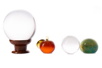 Lot 532 - A CRYSTAL BALL, ALONG WITH ANOTHER AND TWO PAPERWEIGHTS