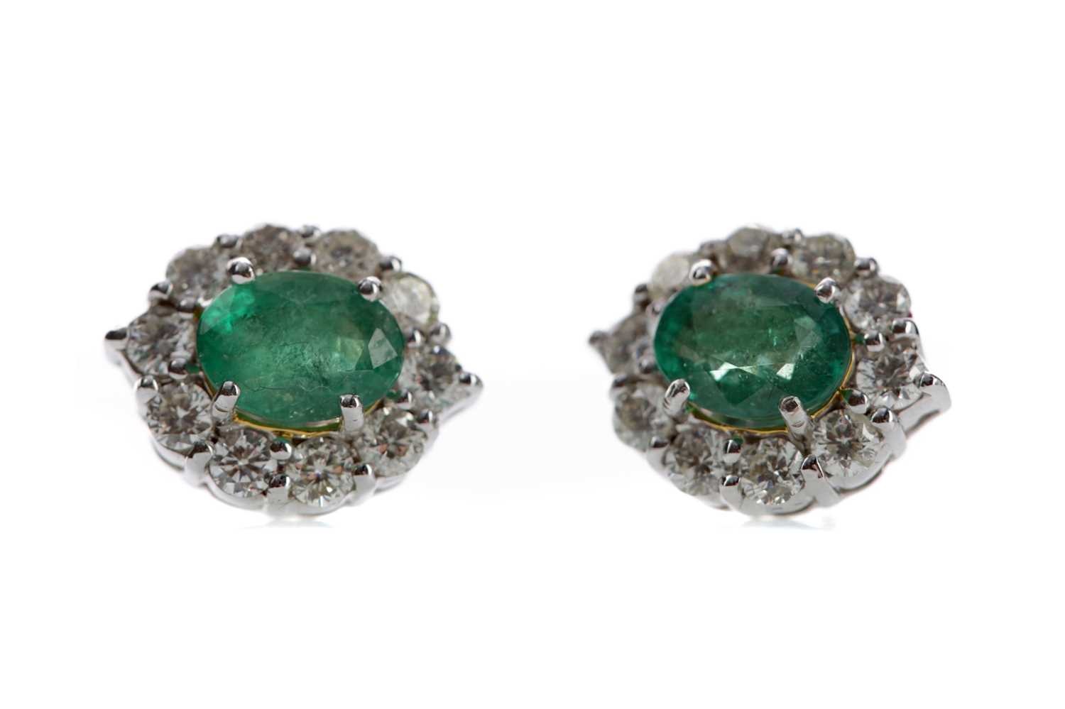 Lot 509 - A PAIR OF EMERALD AND DIAMOND EARRINGS