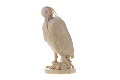 Lot 925 - A JAPANESE IVORY CARVING OF A HERON