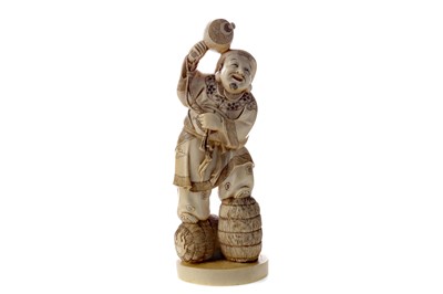 Lot 927 - A JAPANESE IVORY CARVING OF A MAN