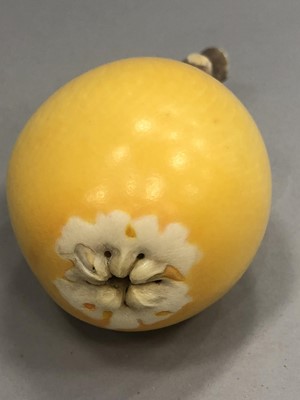 Lot 904 - A JAPANESE IVORY CARVING OF A FRUIT