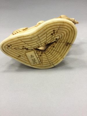 Lot 907 - A JAPANESE IVORY CARVING OF A MONKEY MUSICIAN