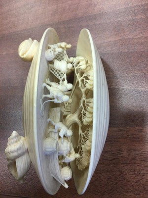 Lot 909 - A JAPANESE IVORY CARVING OF 'THE CLAM'S DREAM
