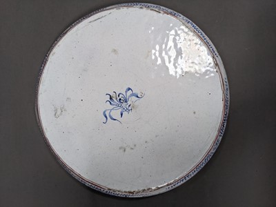 Lot 285 - AN EARLY 20TH CENTURY INDO-PERSIAN BRASS BELL, ALONG WITH A BUDDHIST EMBLEM AND TEN DISHES