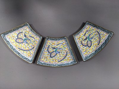 Lot 285 - AN EARLY 20TH CENTURY INDO-PERSIAN BRASS BELL, ALONG WITH A BUDDHIST EMBLEM AND TEN DISHES