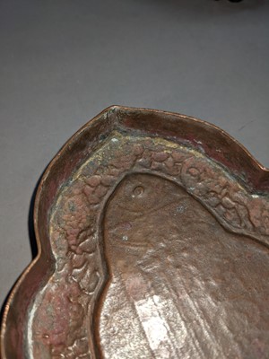 Lot 285 - AN EARLY 20TH CENTURY INDO-PERSIAN BRASS BELL, ALONG WITH A BUDDHIST EMBLEM AND TEN DISHES