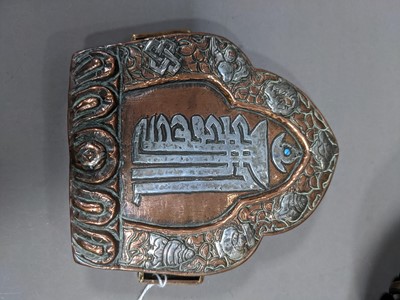 Lot 285 - AN EARLY 20TH CENTURY INDO-PERSIAN BRASS BELL, ALONG WITH A BUDDHIST EMBLEM AND TEN DISHES