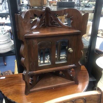 Lot 261 - A MAHOGANY CORNER CABINET