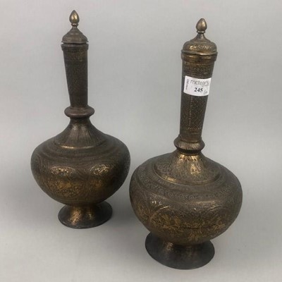 Lot 245 - A PAIR OF EASTERN BRASS VASES