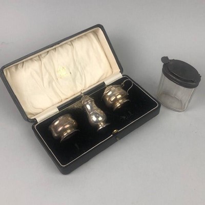 Lot 246 - A SILVER THREE PIECE CRUET SET AND A SILVER LIDDED JAR