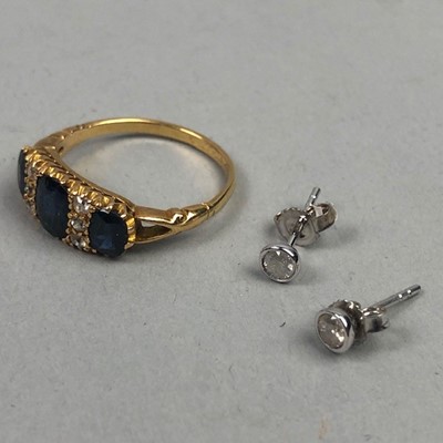 Lot 312 - A PAIR OF DIAMOND STUD EARRINGS AND A RING