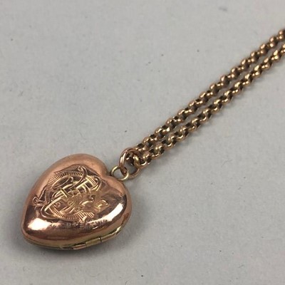 Lot 324 - A HEART-SHAPED LOCKET ON GOLD CHAIN