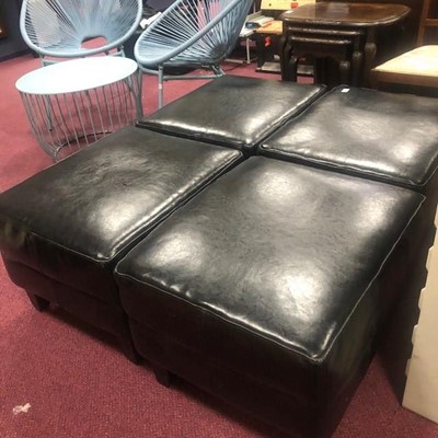 Lot 393 - A SET OF FOUR LEATHER UPHOLSTERED POUFFE/STOOLS