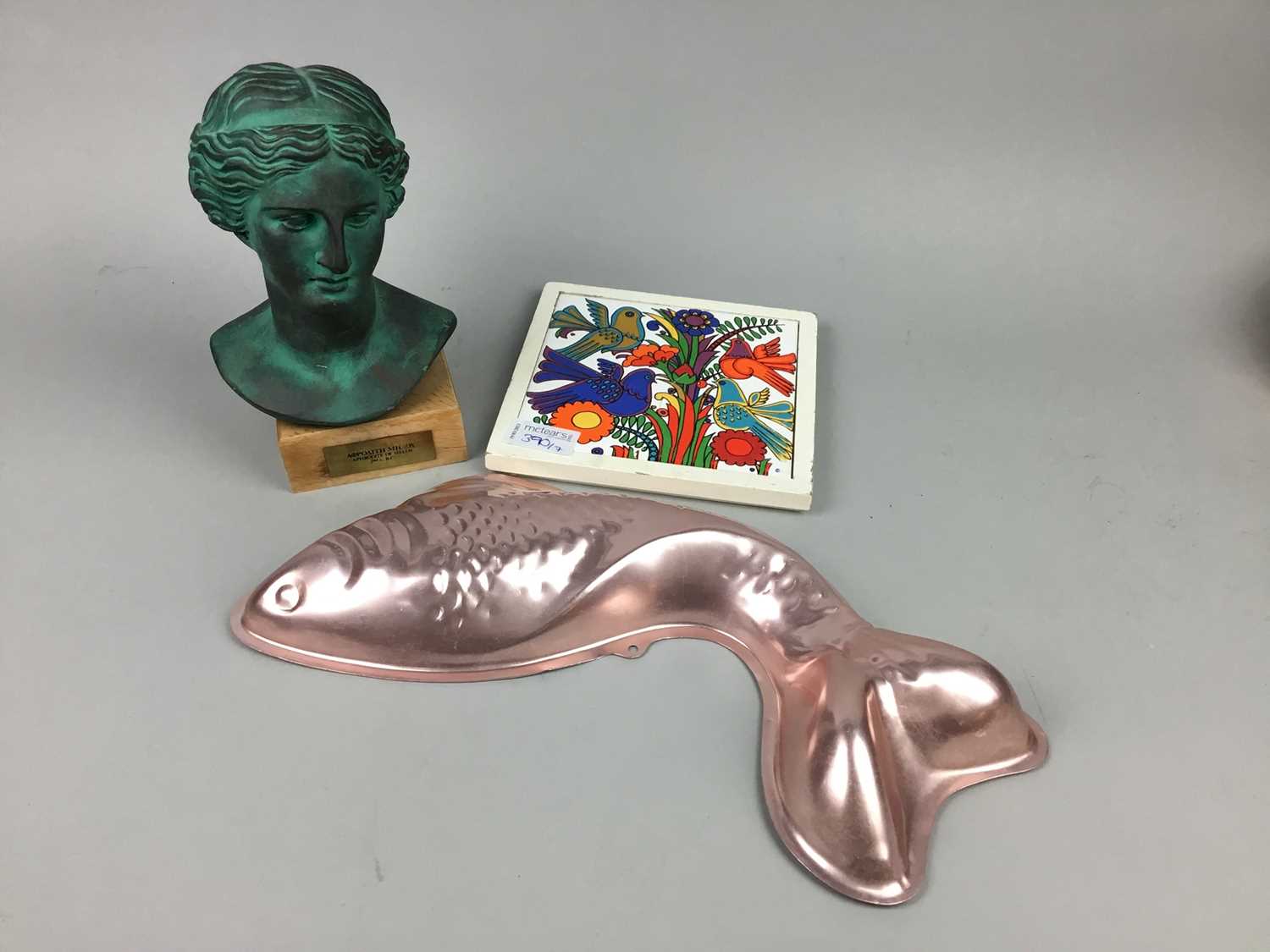 Lot 390 - A LOT OF THREE JELLY MOULDS, CERAMIC TILES AND A MINIATURE BUST ON STAND