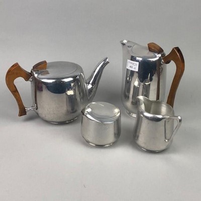 Lot 411 - AMENDMENT - A FOUR PIECE PICQUOT WARE TEA SERVICE