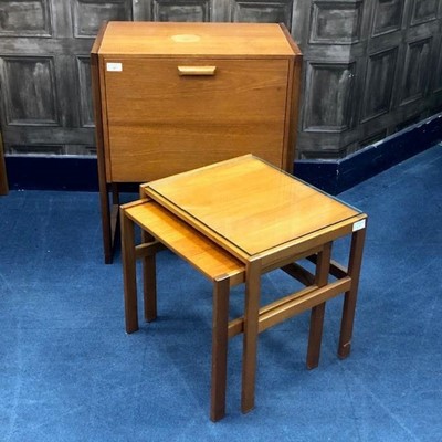 Lot 427 - A RETRO TEAK MUSIC CABINET AND A NEST OF TABLES