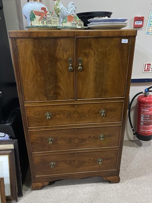 Lot 426 - A MAHOGANY CUPBOARD CHEST