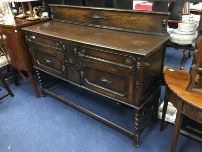 Lot 421 - AN OAK SIDEBOARD