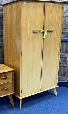 Lot 430 - A WALNUT TWO DOOR WARDROBE