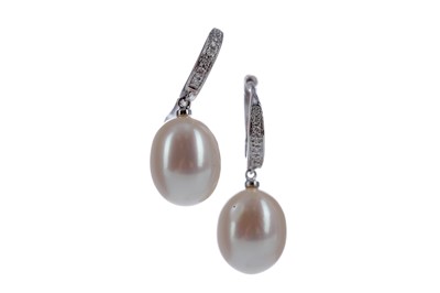 Lot 1317 - A PAIR OF PEARL AND DIAMOND EARRINGS