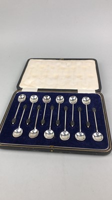 Lot 45 - A SET OF TWELVE SILVER COFFEE SPOONS, ALONG WITH TEASPOONS AND TONGS