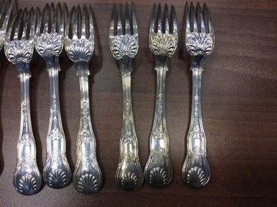 Lot 496 - A COMPOSITE SET OF TWELVE 19TH CENTURY SILVER KING'S PATTERN TABLE FORKS